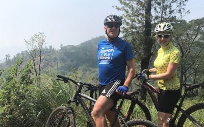 Anne & Peter Latham Cycling on the  tour with redspokes
